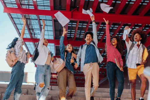 A group of math students who are happy succeeding in their Math exam