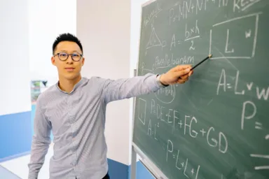 A man teaching math
